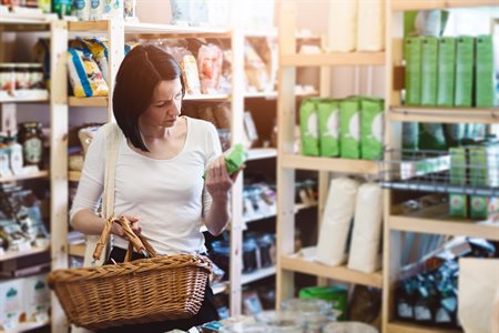 Woman reading food label